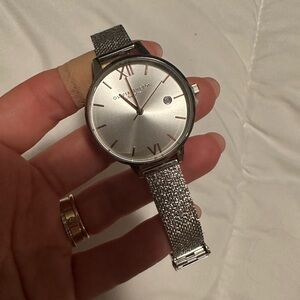 Olivia Burton silver chrome metallic slider watch with rose gold detail